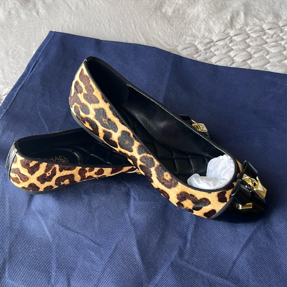 Gently used Michael Kors animal print flats